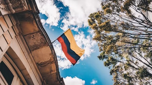 Colombian flag hanging from bulding