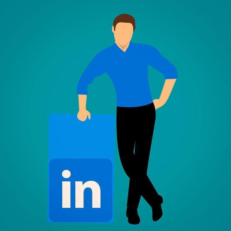 Person in blue shirt standing next to LinkedIn logo (Job Boards)