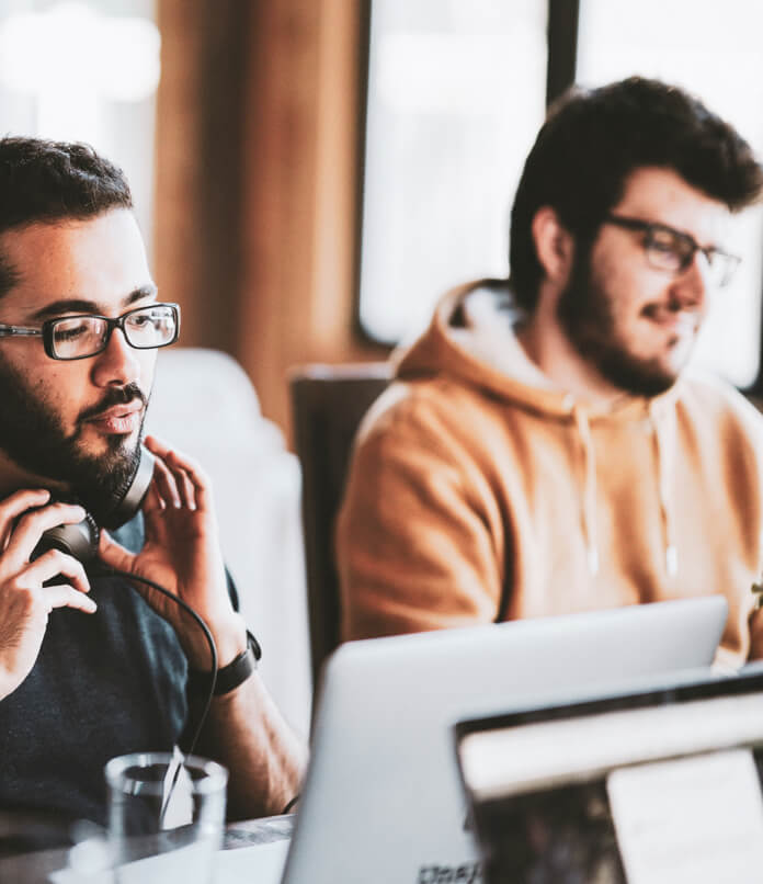 software developers sitting at a desk