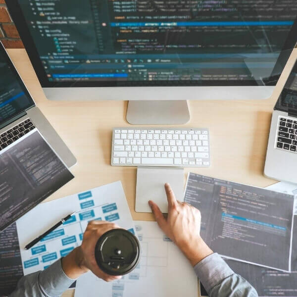 remote work checklist guide sitting on a desk next to a pair of glasses and a small cactus